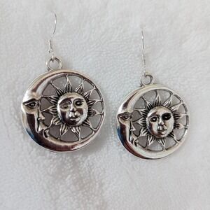 Silver tone crescent moon sun